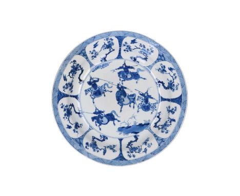 A blue and white porcelain deep charger, decorated with horsemen, flowers and birds. Marked with 6-character mark. China, Kan