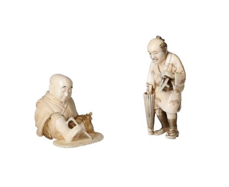 Lot of two netsuke, 1) ivory, seated tied up man drawing with his foot and a rat by his side. Signed Kunimitsu. H. 4 cm. 2) i