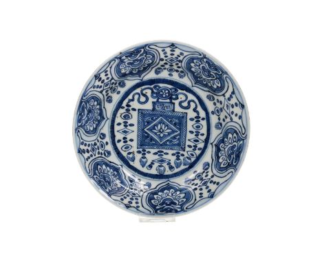 A blue and white 'kraak' porcelain dish, decorated with a tea caddy and napkin work. Unmarked. China, Jingdezhen, early Wanli
