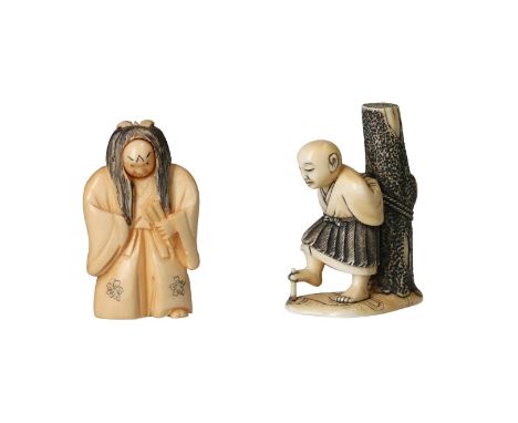 Lot of two netsuke, 1) Ivory, Kabuki actor with large black wig with turning head; smiling and angry. Signed. H.5.5 cm. 2) Iv