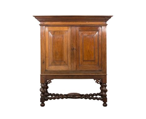 A colonial cabinet on stand, Java, end 17th century.Provenance: ex collection Beltman, The Hague; René Wassing (Purwakarta 19