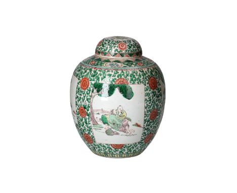 A famille verte ginger jar, decorated with flowers and reserves depicting figures in a garden. Unmarked. China, 19th century.