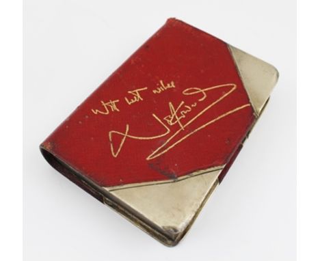 A NOEL COWARD HIP FLASK, modelled as a gilt metal book, red Morocco bound, the spine gilt script "Bitter Sweet" and "Noel Cow