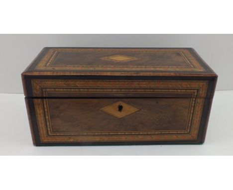 A LATE VICTORIAN TUNBRIDGE WARE TEA CADDY, having herring bone crossbanding, cover opens to reveal two inner compartments, 23
