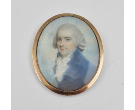 MANNER OF GEORGE ENGLEHEART A GEORGE III PERIOD OVAL PORTRAIT MINIATURE, bust length image of a gentleman in blue coat, circa