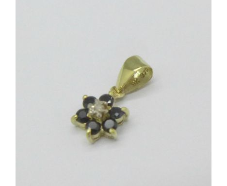 A 9ct gold, diamond and sapphire pendant