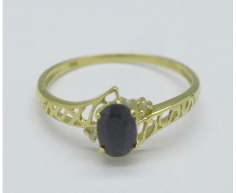 A 9ct gold, sapphire and diamond ring, 1.0g, O