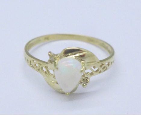 A 9ct gold, opal and diamond ring, 1.0g, O