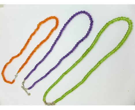 Three silver mounted necklaces, including amethyst and cornelian