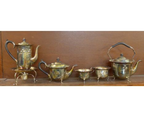 A five piece Art Nouveau hammered silver plate tea service by Mappin & Webb