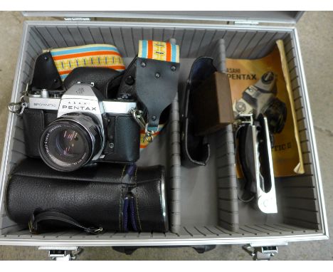 A Pentax Spotmatic II camera and lenses, etc.