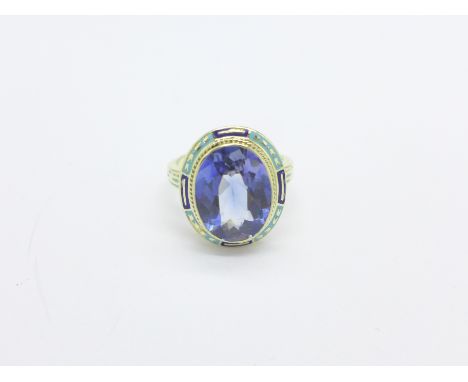 A 14kt gold, enamel and blue stone ring, 7.2g, Q