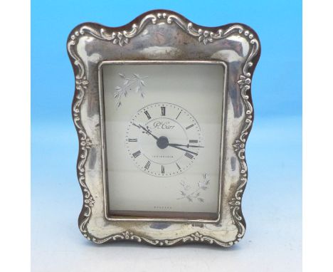 An alarm clock with silver front by Carrs, 14.5cm