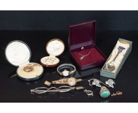 A small collection of jewellery to include two 9ct gold cased ladies watches, three yellow metal tie pins, a 9ct gold necklac