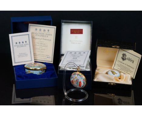 A collection of three enamel boxes to include Halcyon Days and House of Ashley examples. 