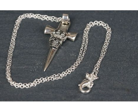 Silver cross necklace with embossed skull decoration 