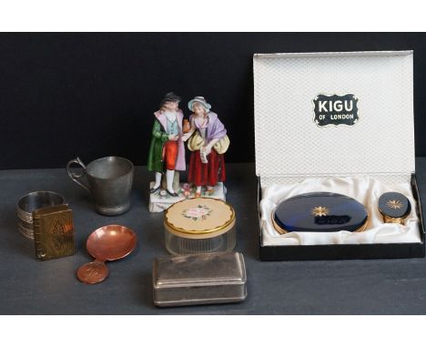 A small group of mixed collectables to include napkin ring, vesta case in the form of a book, ceramic figure..etc. 