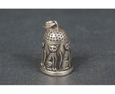 Silver thimble with cat decoration 