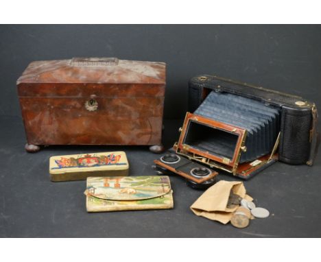 An antique tea caddy together with a Kodak folding camera case. 