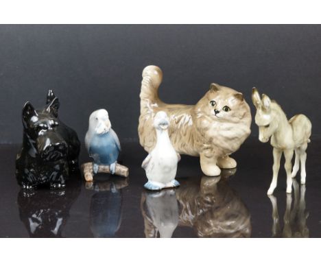 A collection of five ceramic animal figures to include Beswick and Royal Copenhagen examples. 