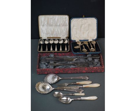 Two cased sets of fully hallmarked sterling silver spoons together with pair of Victorian Silver Serving Spoons with clam she