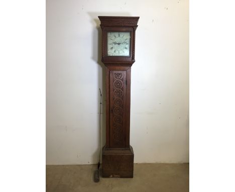 An 18th century oak long case clock with carved detail to front made by John Higgs, Wallingford. W:38cm x D:22cm x H:187cm