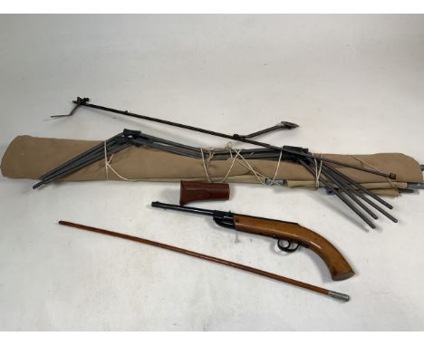 A collection collection of militariia items to include an early 20th century Royal Marines Gibraltar Naval swagger stick a fo