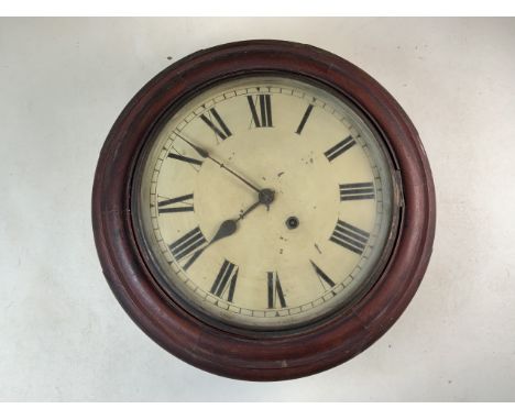 A circular mahogany railway style wall clock with painted metal dial and Roman numeral markers. W:42cm x D:13cm x H:42cm