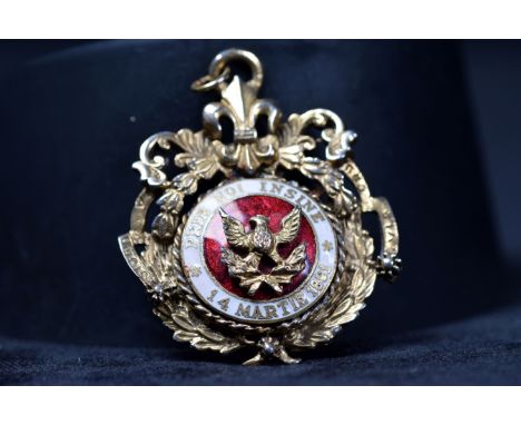 A yellow metal Romanian order of the crown enamel pendant by Cora. 23g. 50mm