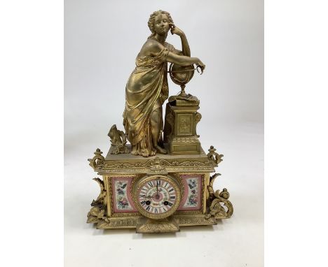 A French 19th century gilt-metal and porcelain mantel clock: the eight-day duration movement striking the hours on a bell, th