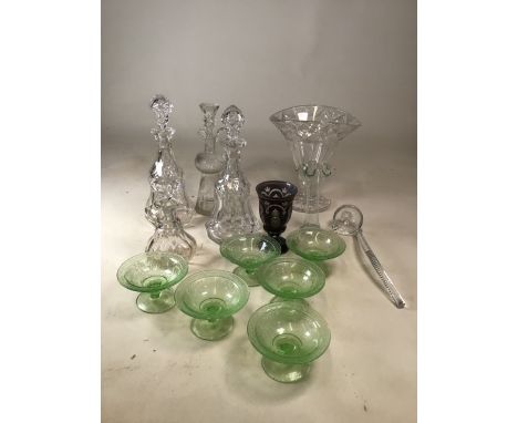 A collection of glass including decanters, six uranium glass dishes and a ladle