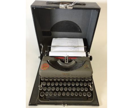 An Imperial Good Companion Model T typewriter in original case ( not in working order)