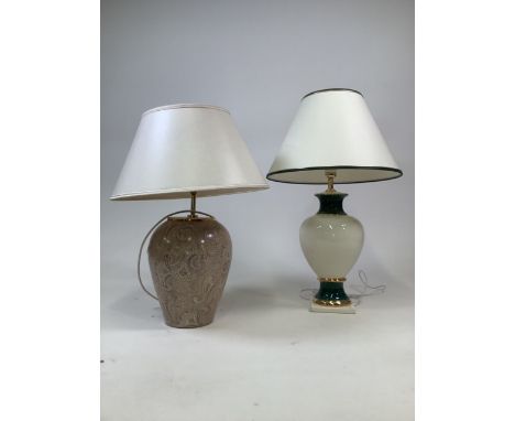 Two modern ceramic table lamps. Cream lamp base to top of shade W:23cm x H:73cmPaisley lamp base to top of shade W:23cm x H:6