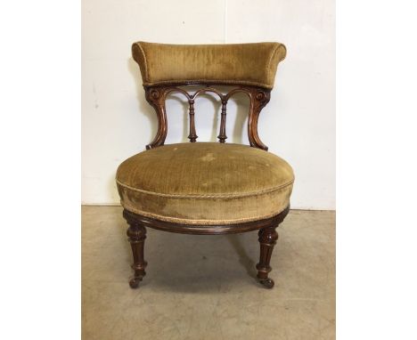 A Victorian upholstered drum nursing chair on ceramic castors.W:55cm x D:55cm x H:70cm
