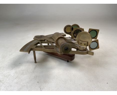 An early 20th century brass sextant, marked Stanley. W:21cm x D:11cm x H:22cm