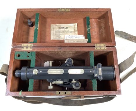 A surveyors level by Stanley, London fitted for tacheometrical reading, in a rectangular wooden box, with leather handle.