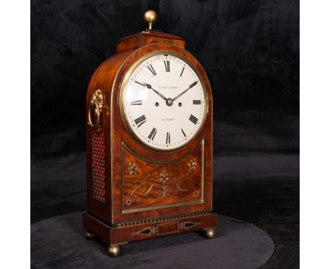 A Georgian inlaid mahogany bracket clock with circular convex 8 inch enamel dial inscribed Handley and Moore London with bras