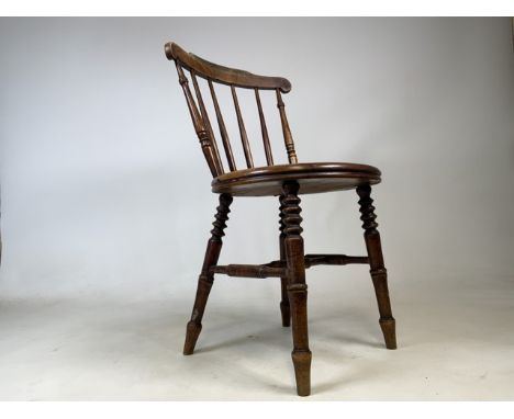 A round seated country kitchen stick back chair.W:41cm x D:42cm x H:80cm