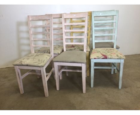 A set of six pine painted ladder back chairs. W:45cm x D:44cm x H:103cm
