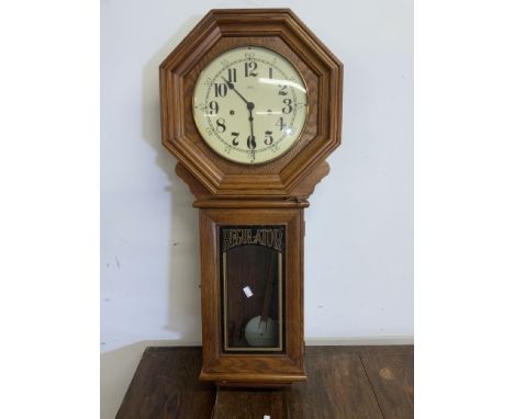 A reproduction Ridgeway regulator drop head wall clock. W:45cm x H:102cm