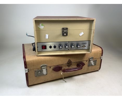 An Overpond 1950's suitcase with burgundy leather handle and plastic edging also with a Coomber record player.