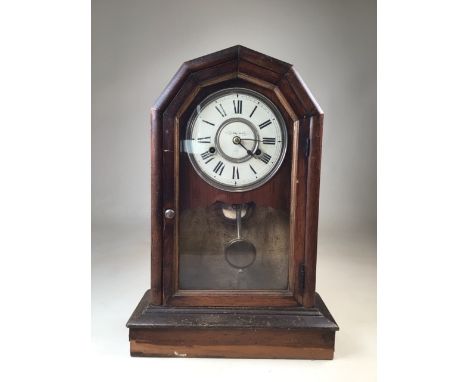 An oak mantle clock dated 1878 with glazed door to front W:32cm x D:42.5cm x H:47cm