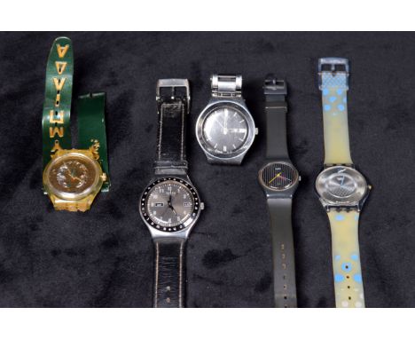 Two steel cased and two rubber cased vintage Swatch wrist watches.