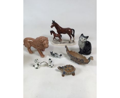 A collection of 20th Century ceramic ornaments including Wade and Beswick