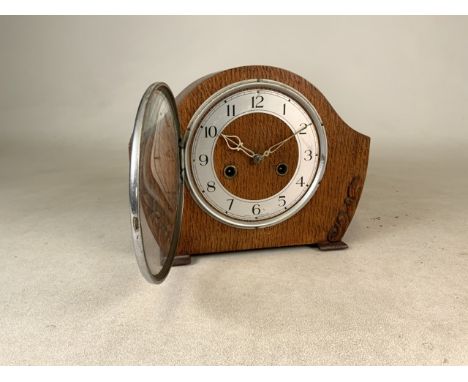 An eight day mantle clock by Smiths in Enfield, UK. H:20cm