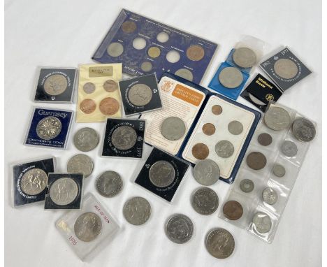 A collection of British vintage, decimal and commemorative coins. To include Britain's First Decimal coin set, Guernsey Commo