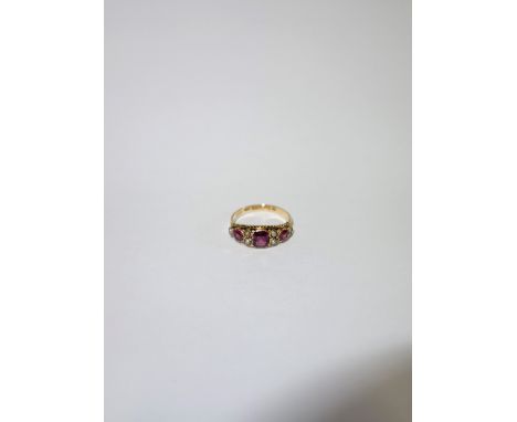 A 15CT YELLOW  GOLD DRESS RING, set with gemstones and seed pearls, rings size N 