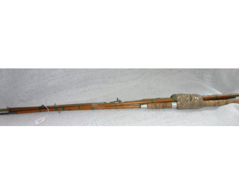 A VINTAGE SPLIT CANE FISHING ROD