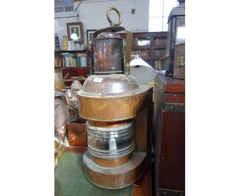A LARGE COPPER SHIPS LAMP, by "CHRISTEN SMITH BERGEN", 75 cm high (including hanging ring)