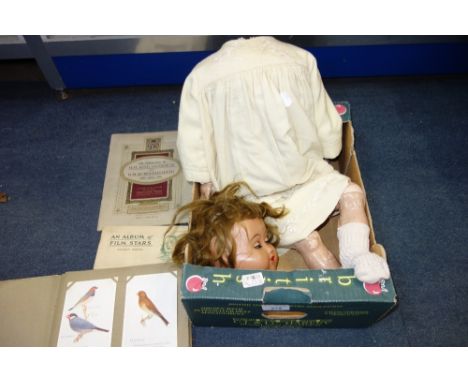 A VINTAGE COMPOSITE DOLL, a collection of Postcards of birds and a quantity of cigarette cards